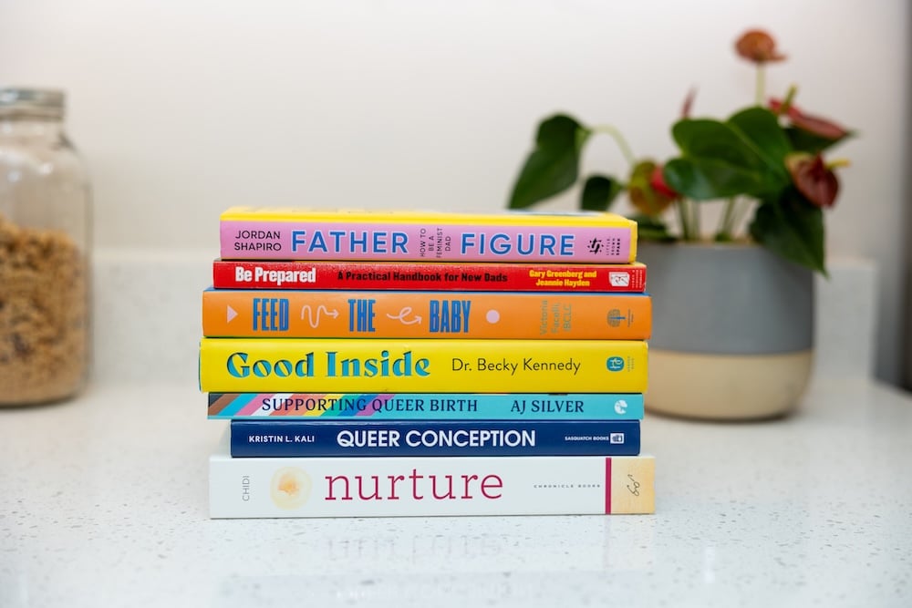 stack of colorful favorite pregnancy and birth books